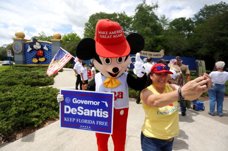 Supporters of Florida's Republican-backed "Don't Say Gay" bill gather outside Walt Disney World