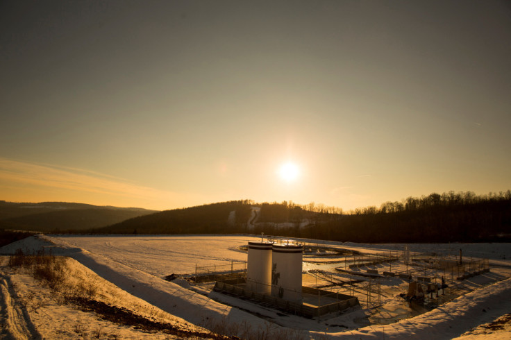 A Chesapeake Energy natural gas well pad rests on the hill in Litchfield Township