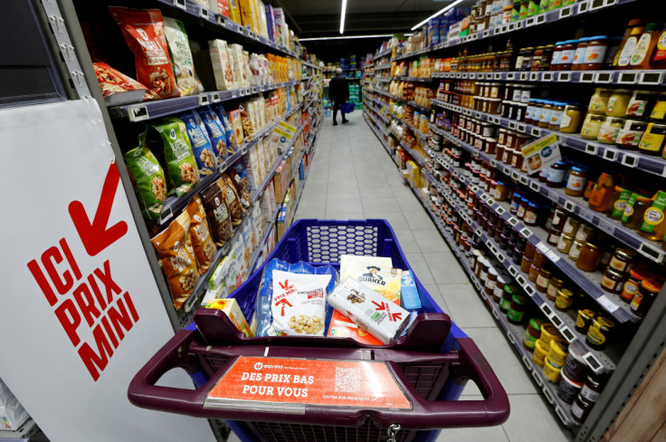 Customers shop in a supermarket in Nice