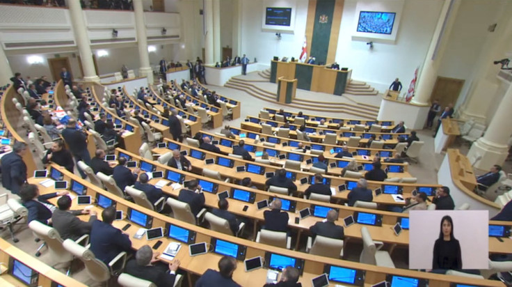 Lawmakers attend a plenary session of parliament in Tbilisi