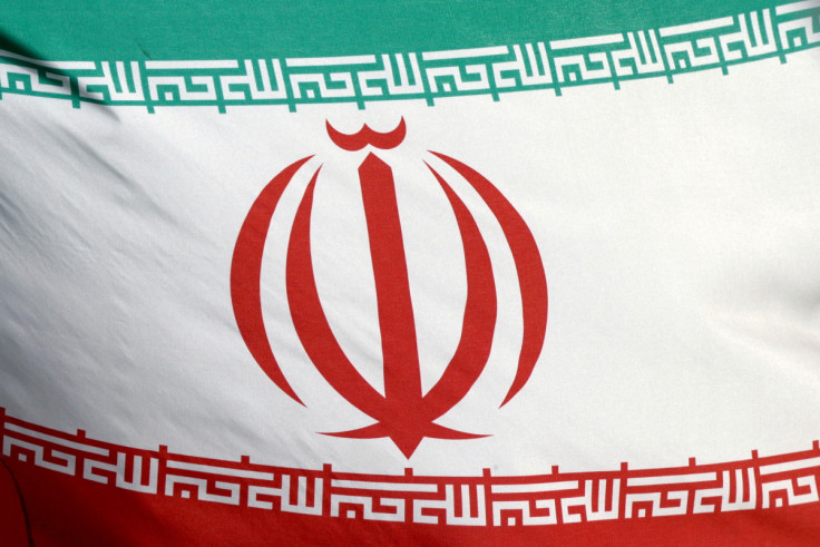 The Iranian flag flies in front of the IAEA headquarters in Vienna