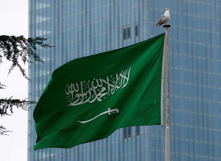 A Saudi flag flutters atop Saudi Arabia's consulate in Istanbul