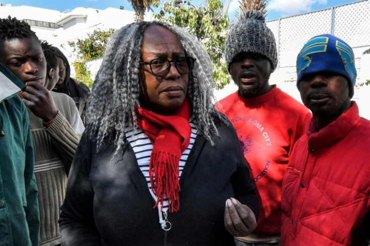 Saadia Mosbah, who heads the anti-racism campaign group Mnemty, visits a camp housing sub-Saharan African migrants in Tunis on March 7