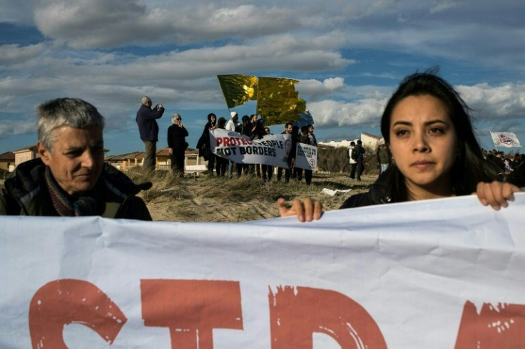 'Stop the massacre, now!' protesters at the site of the shipwreck which killed 76 migrants off Italy's southern Calabria coast two weeks ago
