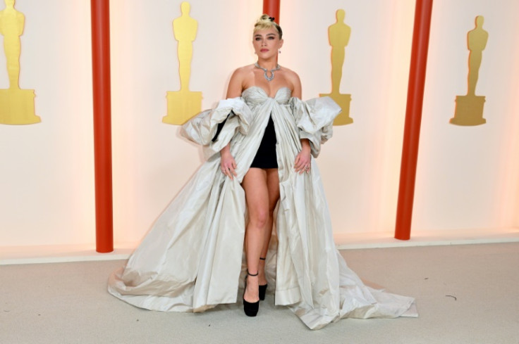 Florence Pugh brought her signature swagger to the Oscars red carpet in Valentino