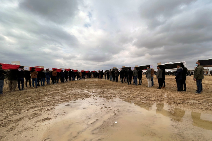 Burial of victims killed by Islamic State after bodies' exhumation from mass graves in Kojo