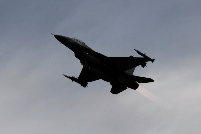 A F-16 fighter jet takes off during a military drill at Zhi-Hang Air Base in Taitung