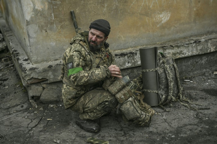 A Ukrainian serviceman prepares to join the front line near the city of Bakhmut