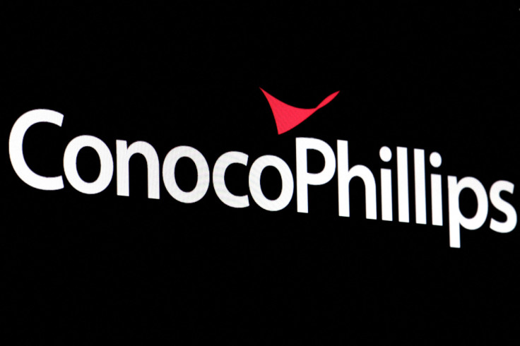 A screen displays the logo for ConocoPhillips on the floor of the NYSE in New York