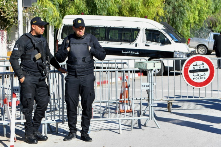 Tunisian police block the entrance to parliament as the new assembly holds its first session in Tunis