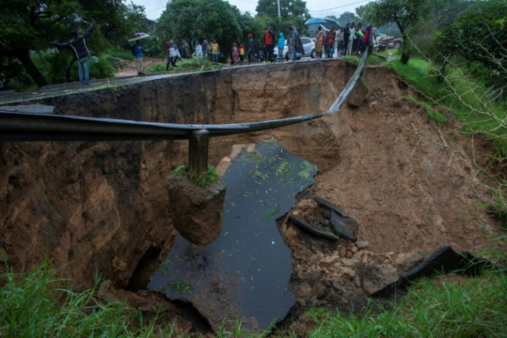 A collapsed road caused by floods from Freddy's torrential rains in Blantyre, Malawi, on Monday