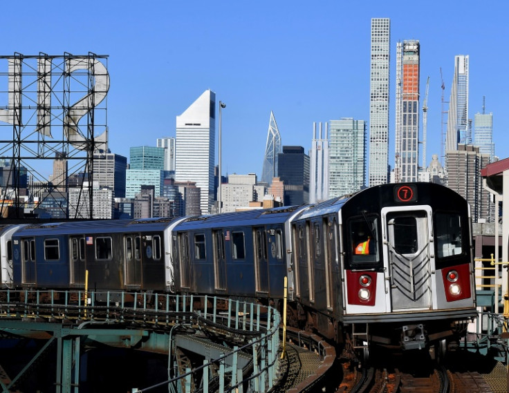 New York police have warned youngsters 'surfing' on the roofs of subway trains that the underground network is 'not a playground'