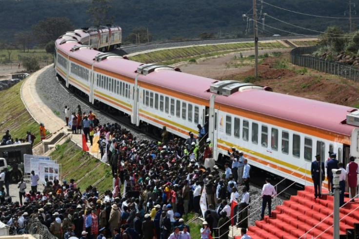 Passengers disembark from the Standard Gauge Railway in Kenya, which was constructed by the Chinese Communications Construction Company and financed by Chinese government