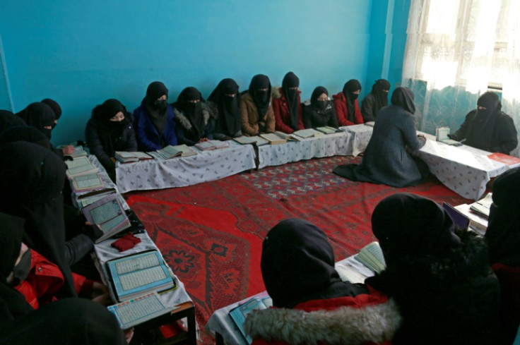 Afghan girls learn the holy Koran at a madrassa on the outskirts of Kabul