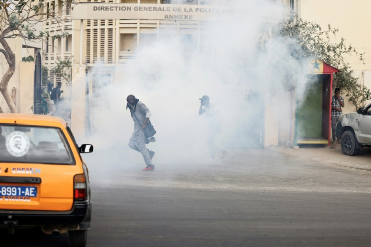 Senegalese youth clashed with security forces outside the politically charged trial of an opposition leader