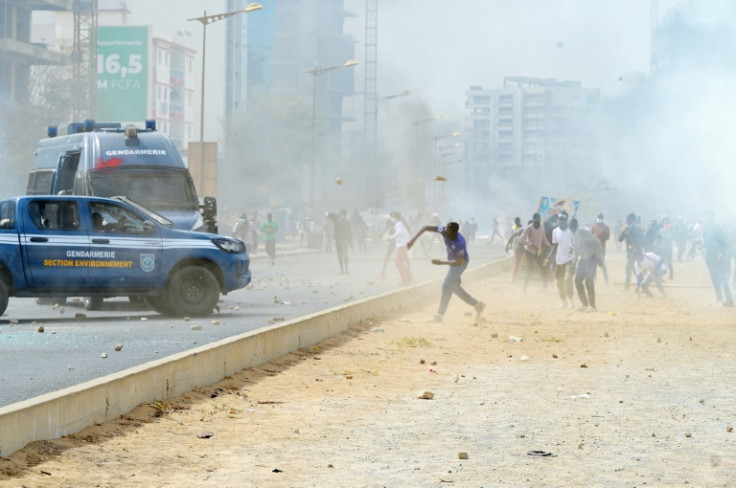 Sonko's journey to court -- under heavy police escort, through a city on high alert -- was fraught with unrest