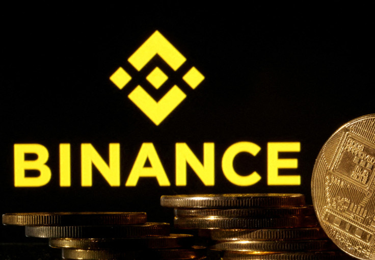 A composition showing crypto currency with the Binance logo