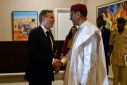 Nigerien President Mohamed Bazoum greets US Secretary of State Antony Blinken at the presidential palace in Niamey