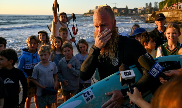 On the morning of March 17, 2023 Johnston raised $215,530 which will go to the Chumpy Pullin Foundation and towards youth mental health causes. Australian former professional surfer Blake Johnston speaks to the media after spending 30 hours in the water, 