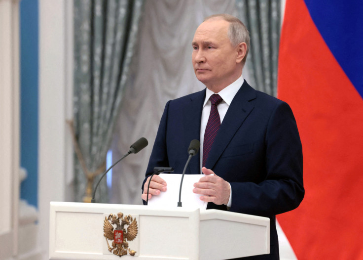 Russian President Putin attends a ceremony marking International Women's Day