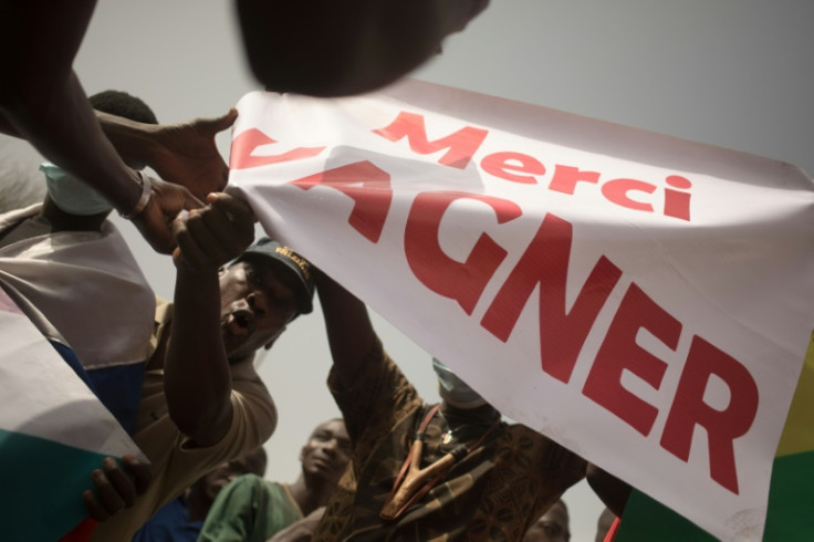 Protesters in the Malian capital Bamako hold a banner reading 'Thank you Wagner' at a rally in February 2022 to celebrate France's announcement that it would withdraw from the country