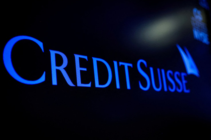 The Credit Suisse logo is displayed on a screen on the floor of the NYSE in New York