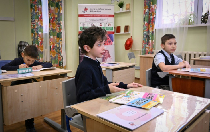 Russian boys attend a Chinese lesson at the ChineseFirst language centre, in the town of Reutov, outside Moscow