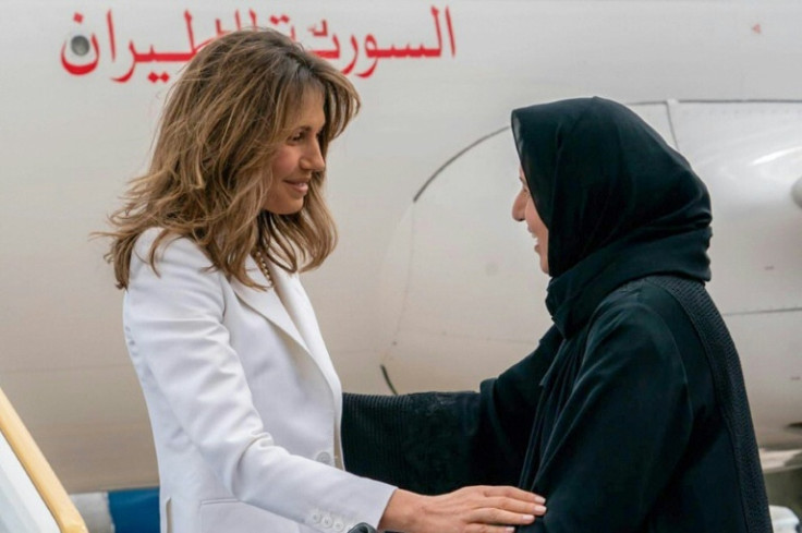 President Bashar al-Assad's wife Asma joined him in a first joint trip abroad in over a decade