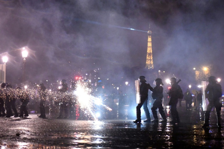 Some protesters clashed with police at central Paris demonstrations over the pension reform