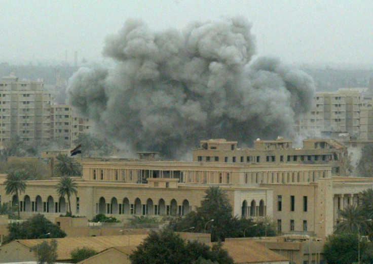 Smoke billows from an explosion during a fierce battle between US troops and Iraqi forces in the presidential compound in Baghdad in this file photo from April 8, 2003