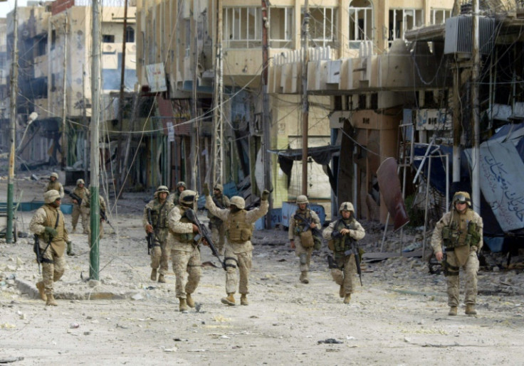 US Marines from the 3/5 Lima Company are seen after taking a key bridge in the restive city of Fallujah, in this file photo from November 24, 2005