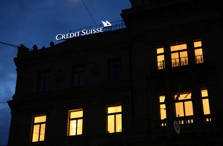 People demonstrate in front of the Credit Suisse headquarters in Zurich
