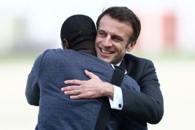 Macron embraced the former hostage in front of the cameras