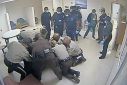 Virginia sheriff deputies wrestle with Irvo Otieno at a state mental hospital in Petersburg