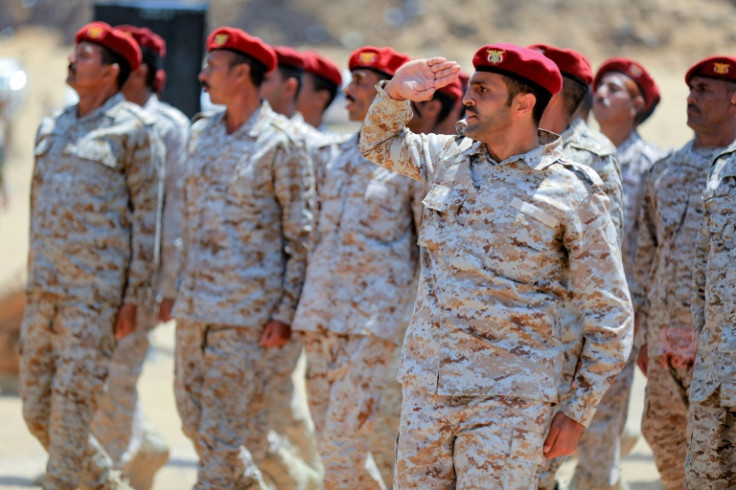 Fighters loyal to Yemen's Saudi-backed government parade during an officers' graduation ceremony in the northeastern province of Marib