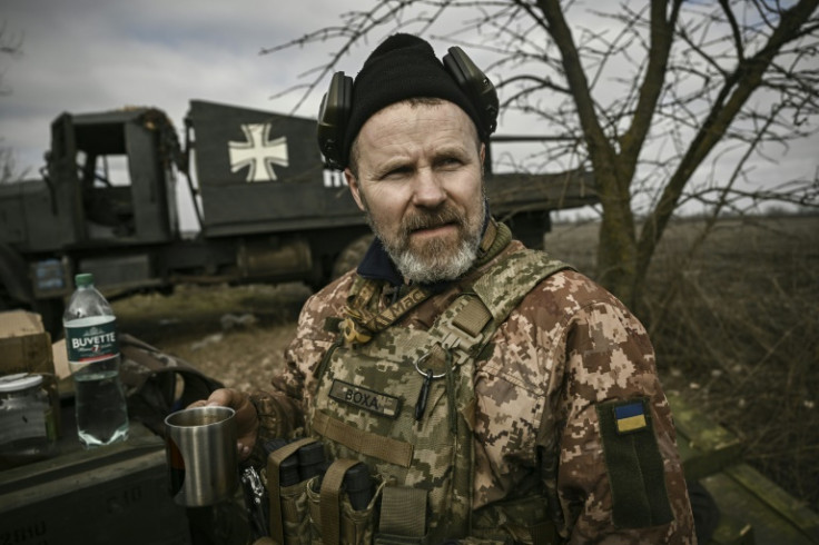 Ukrainian serviceman who goes by the call sign Tsil stands by his artillery unit near Bakhmut