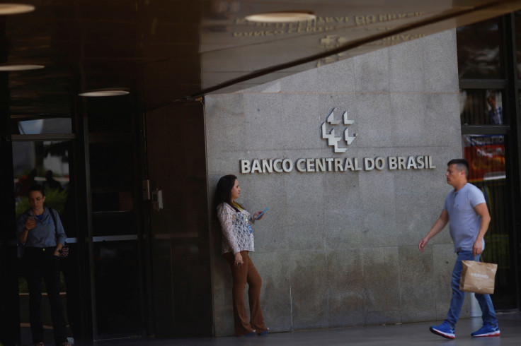 A man walks in front of the Central Bank headquarters building in Brasilia