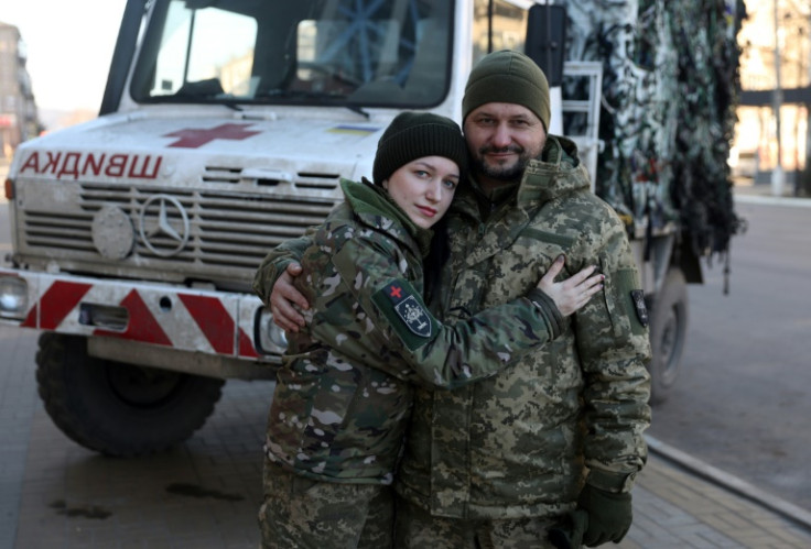 Ivan Synchina and his daughter Marta know many immediate family members serving side by side