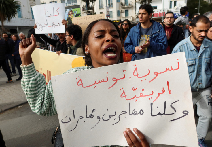 Members of rights groups protest in Tunis