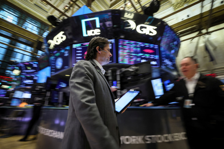 Traders work on the floor of the NYSE in New York