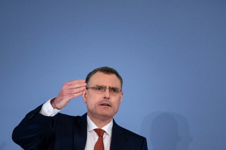 SNB chairman Thomas Jordan said the forced tie-up was meant to avoid triggering a wider banking crisis -- but accepted there were domestic competition issues