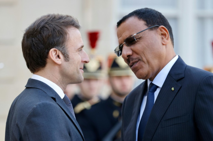 Allies: French President Emmanuel Macron, left, welcomes Nigerien President Mohamed Bazoum in Paris on February 16