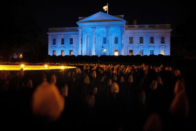 The North Portico of the White House is illuminated in blue for Autism Awareness Day, in Washington