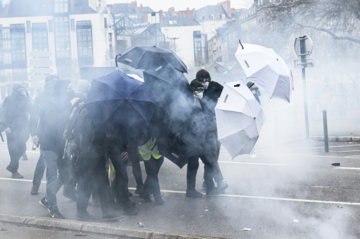 Protesters said Macron's defiance and abrasive ruling style had motivated them to hit the streets