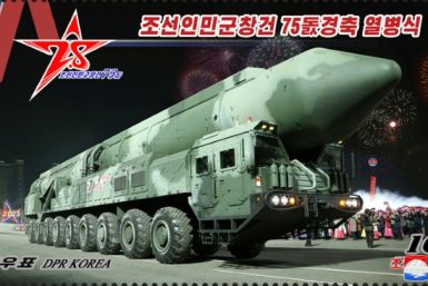 This undated image released by North Korea's official Korean Central News Agency (KCNA) on March 23, 2023 shows a postage stamp issued in North Korea with an illustration from the recent parade in Pyongyang of an intercontinental ballistic missile (ICBM) 