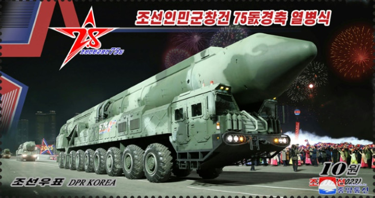 This undated image released by North Korea's official Korean Central News Agency (KCNA) on March 23, 2023 shows a postage stamp issued in North Korea with an illustration from the recent parade in Pyongyang of an intercontinental ballistic missile (ICBM) 