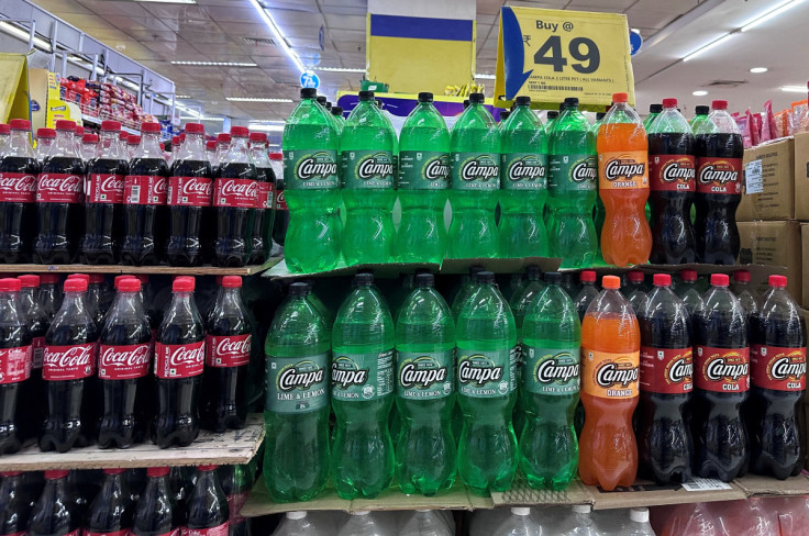 Bottles of Campa Cola and Coca Cola are displayed at a Reliance Smart supermarket in Mumbai