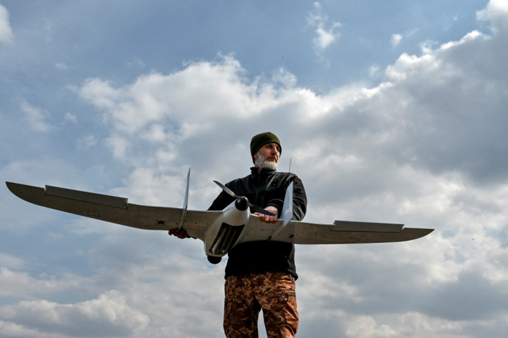 Ukrainian serviceman holds an unmanned aerial vehicle at a position near a frontline in Zaporizhzhia region