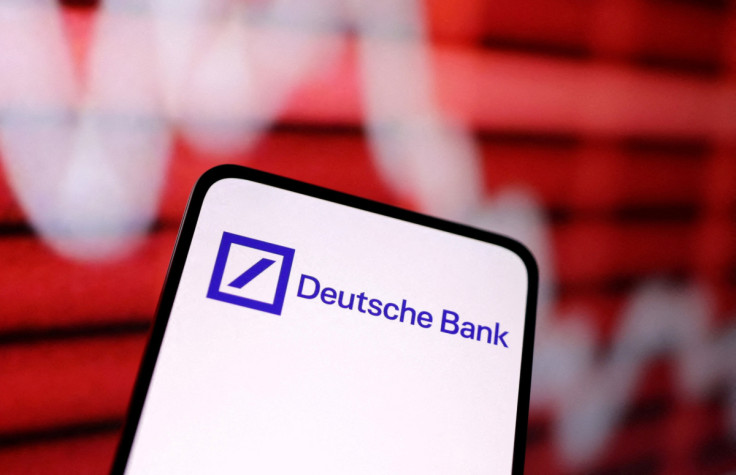 Illustration shows Deutsche Bank logo and decreasing stock graph
