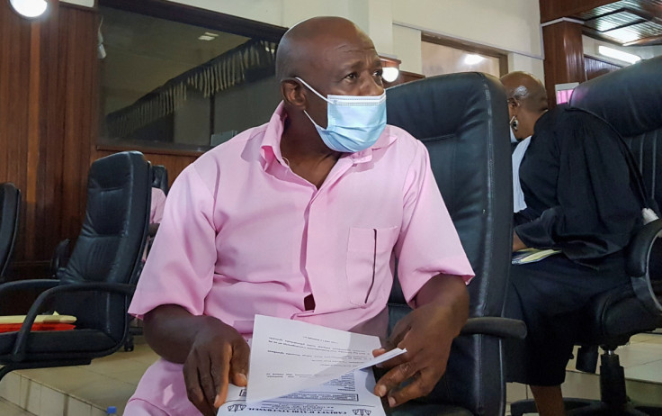 Paul Rusesabagina, portrayed as a hero in a Hollywood movie about Rwanda's 1994 genocide, sits inside a courtroom in Kigali